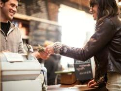 paying with cash, business owner